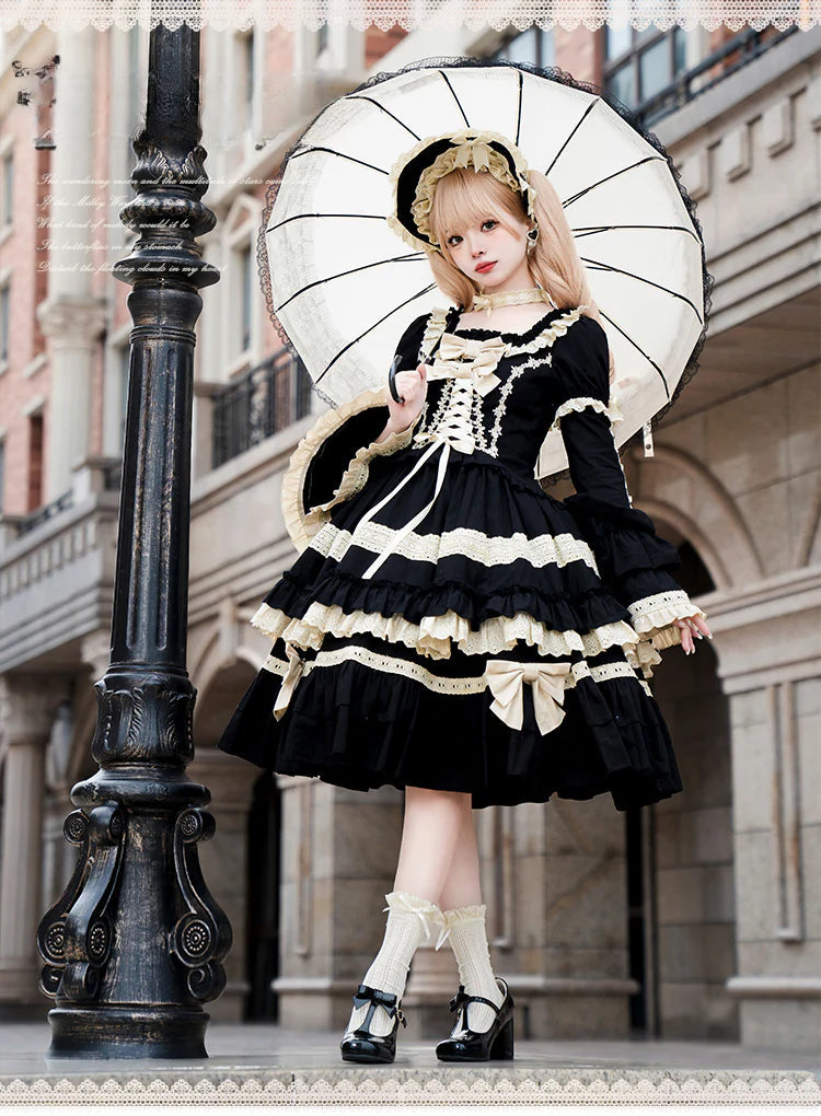 Elegant Black and Cream Lolita Dress with Multi-Tiered Ruffles and Detachable Apron