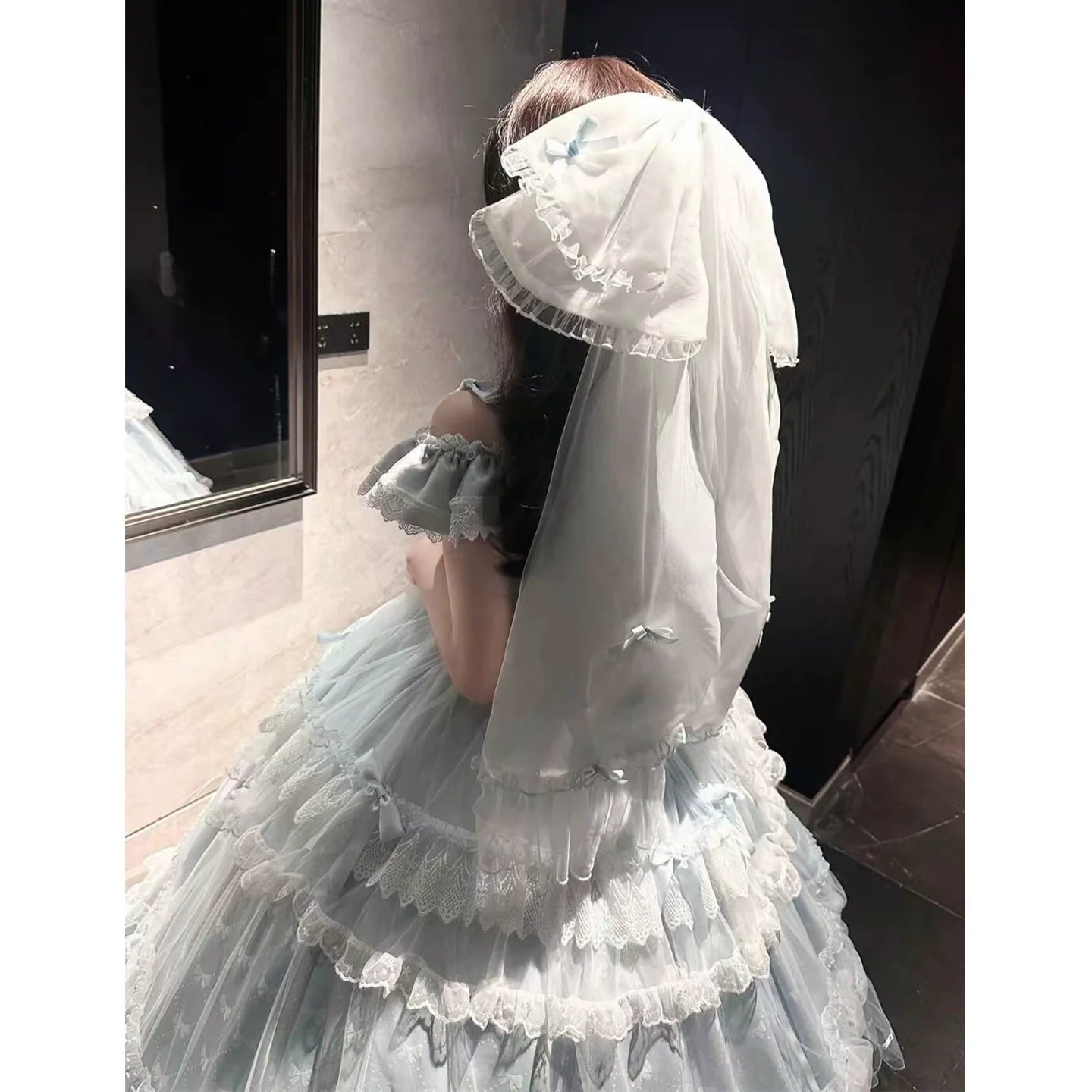 Off - the - shoulder Lolita Gown with Intricate Lace and Multiple Tiers of Ruffles