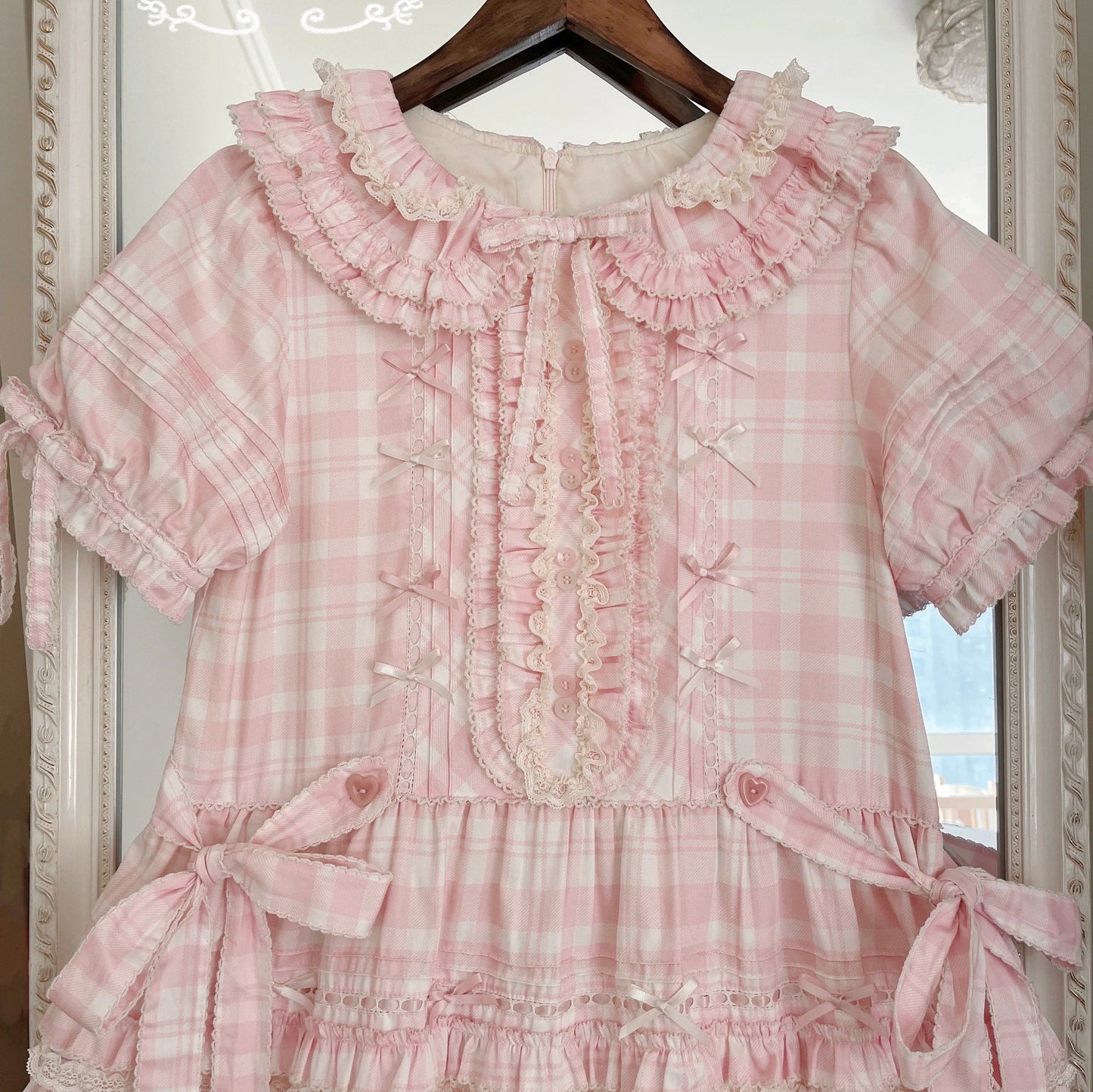 Pastel Pink Checkered Lolita Dress with Ruffled Skirt and Delicate Embellishments