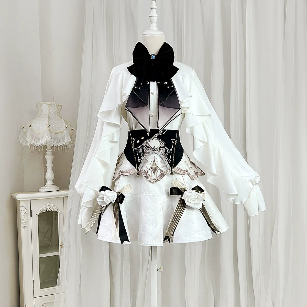 White Gothic-style dress set: court-inspired top and mermaid skirt with waist belt