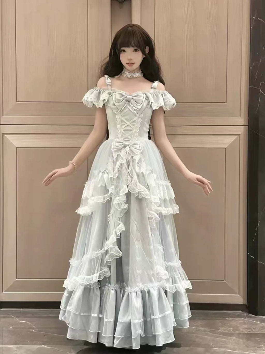 Off - the - shoulder Lolita Gown with Intricate Lace and Multiple Tiers of Ruffles