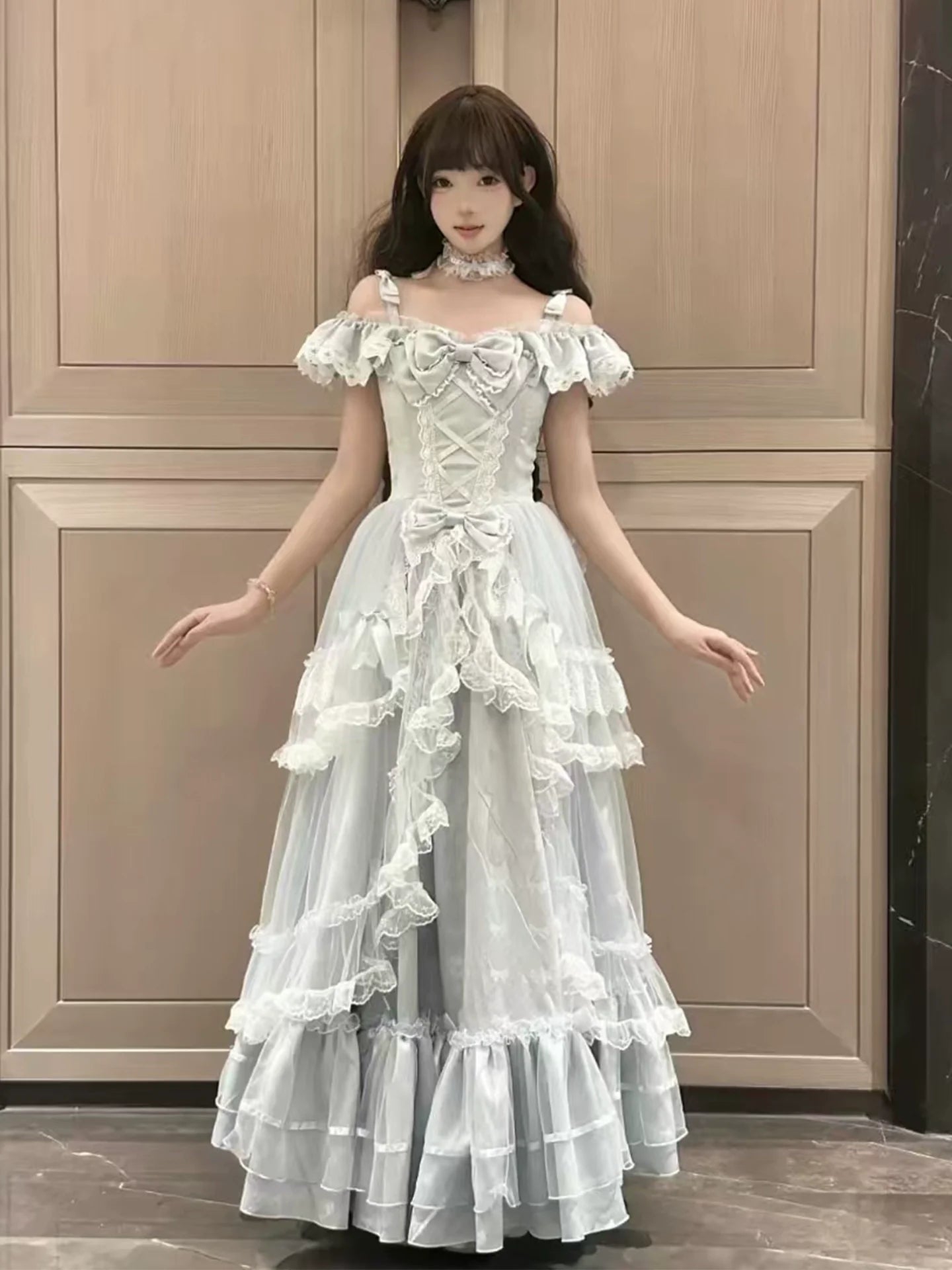 Off - the - shoulder Lolita Gown with Intricate Lace and Multiple Tiers of Ruffles