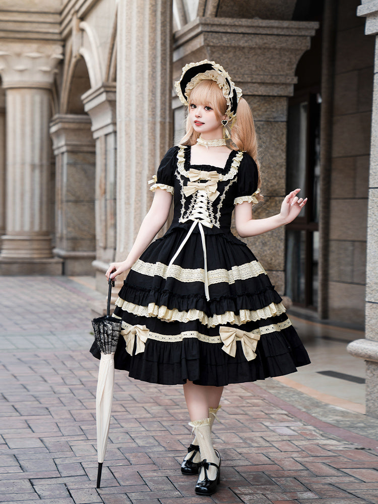 Elegant Black and Cream Lolita Dress with Multi-Tiered Ruffles and Detachable Apron