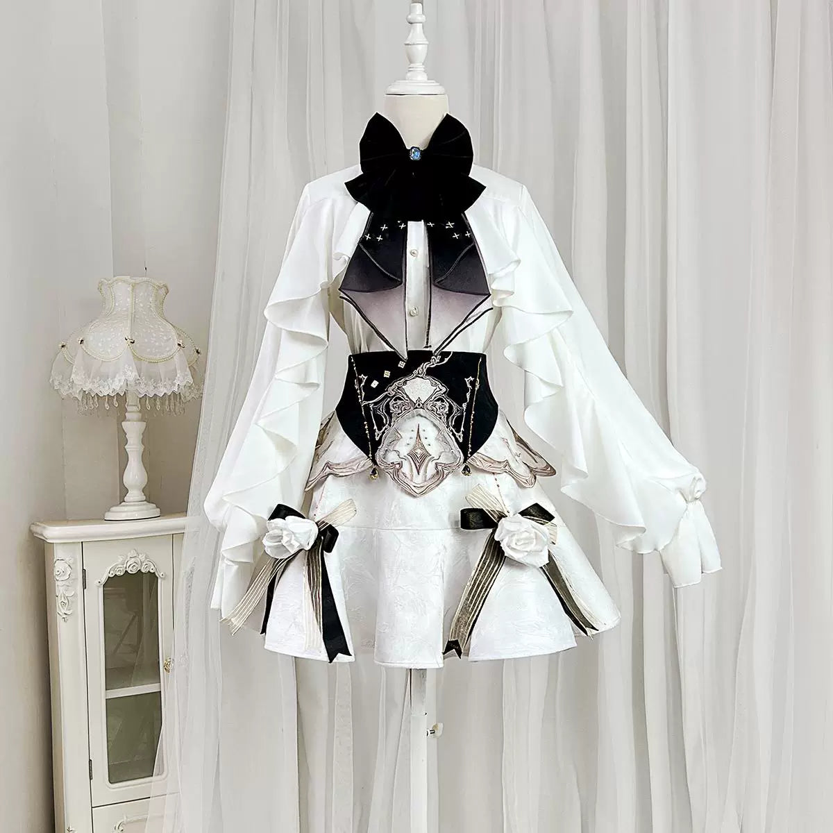 White Gothic-style dress set: court-inspired top and mermaid skirt with waist belt