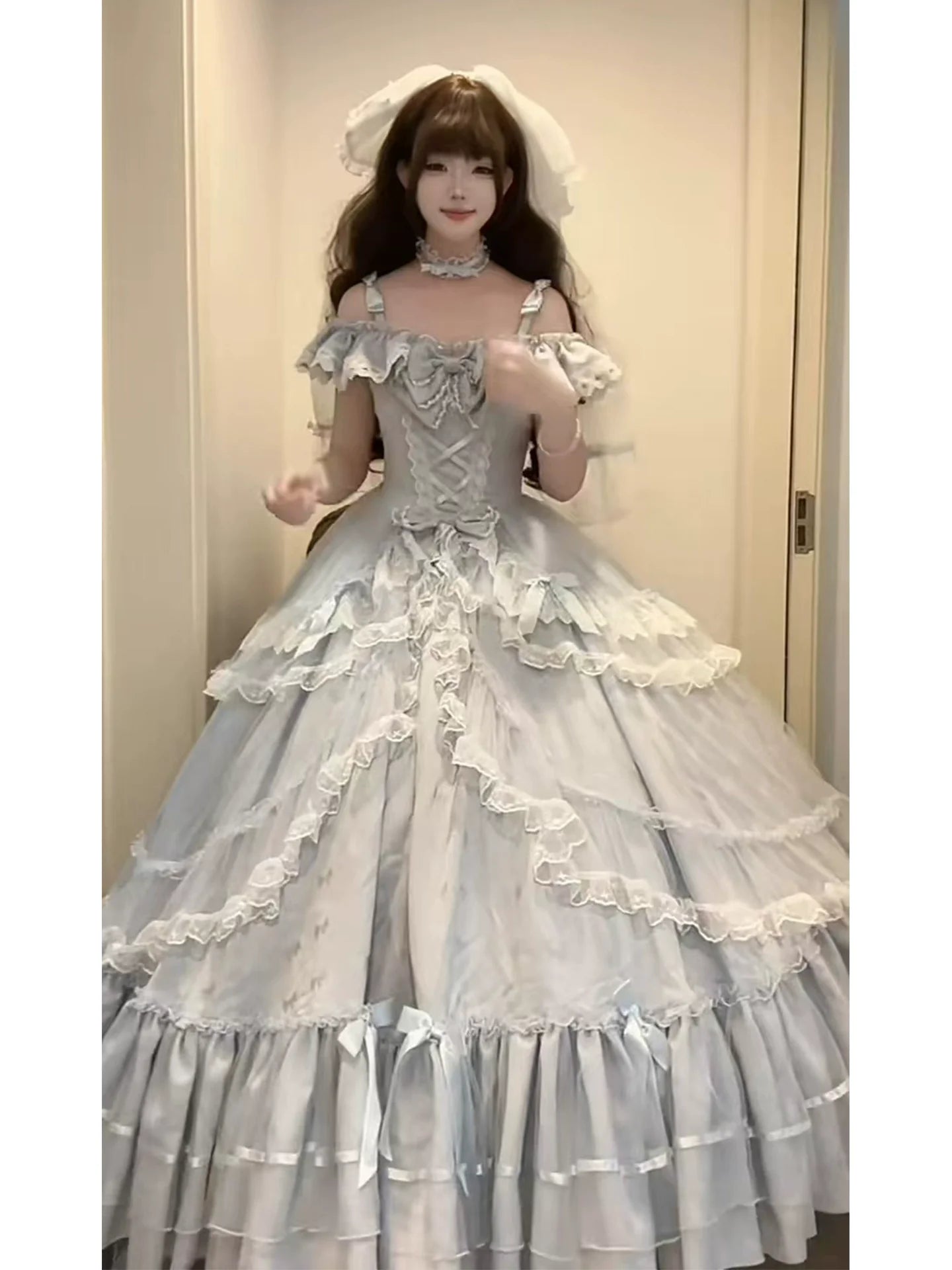 Off - the - shoulder Lolita Gown with Intricate Lace and Multiple Tiers of Ruffles