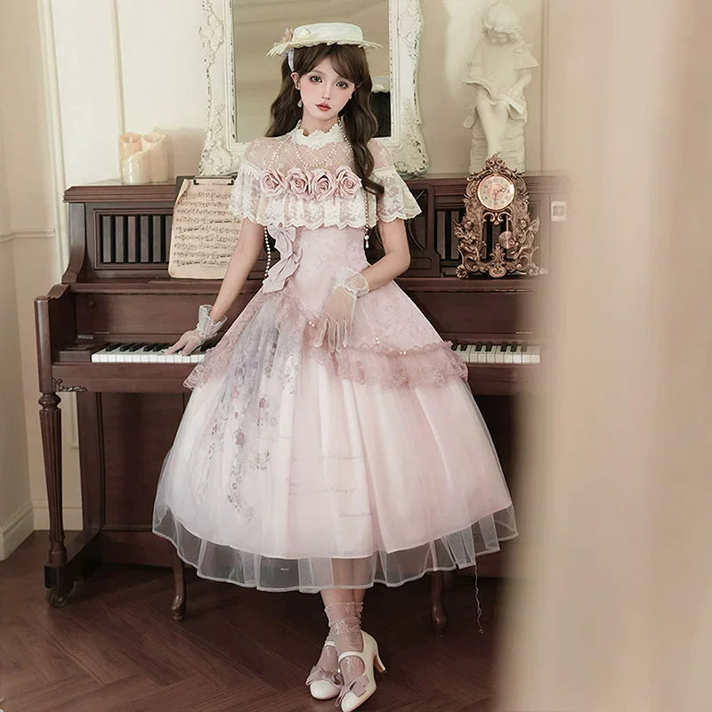 Vintage - inspired Pink Tea - length gown with Floral Lace and Tulle Layers, set for spring and summer