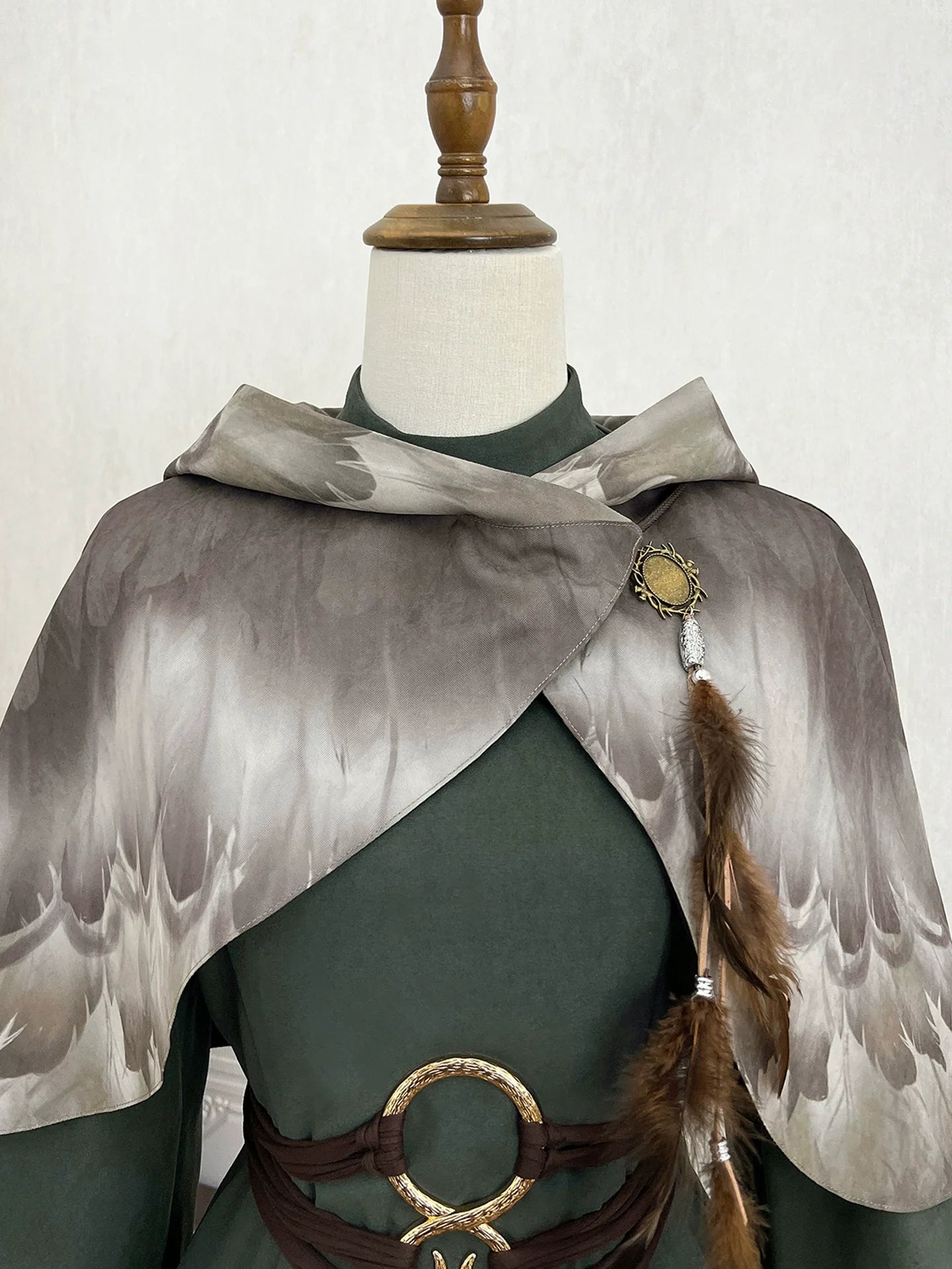 Fantasy - Style Capelet Dress with Embroidered Hem and Buckled Waist Belt