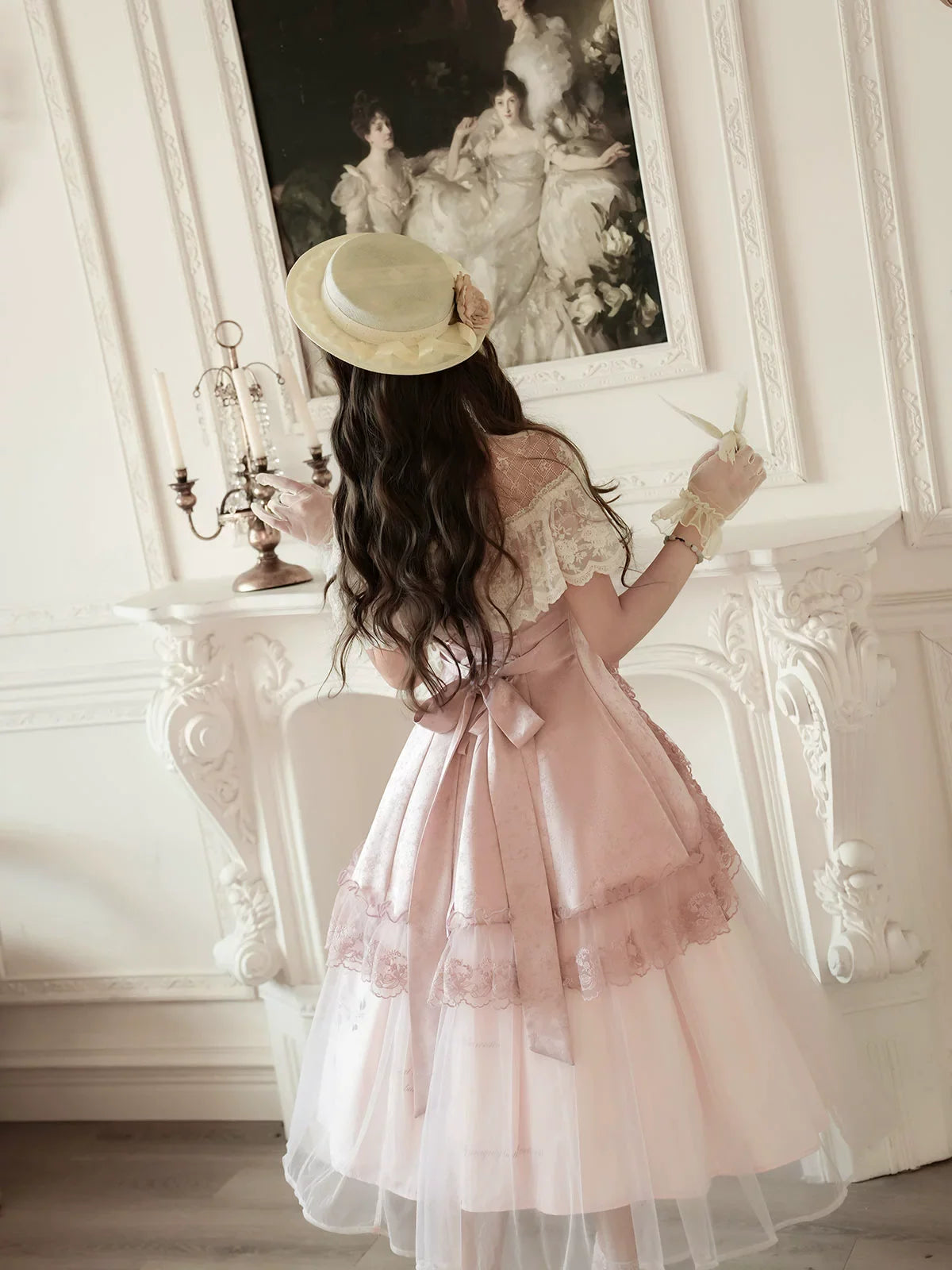 Vintage - inspired Pink Tea - length gown with Floral Lace and Tulle Layers, set for spring and summer
