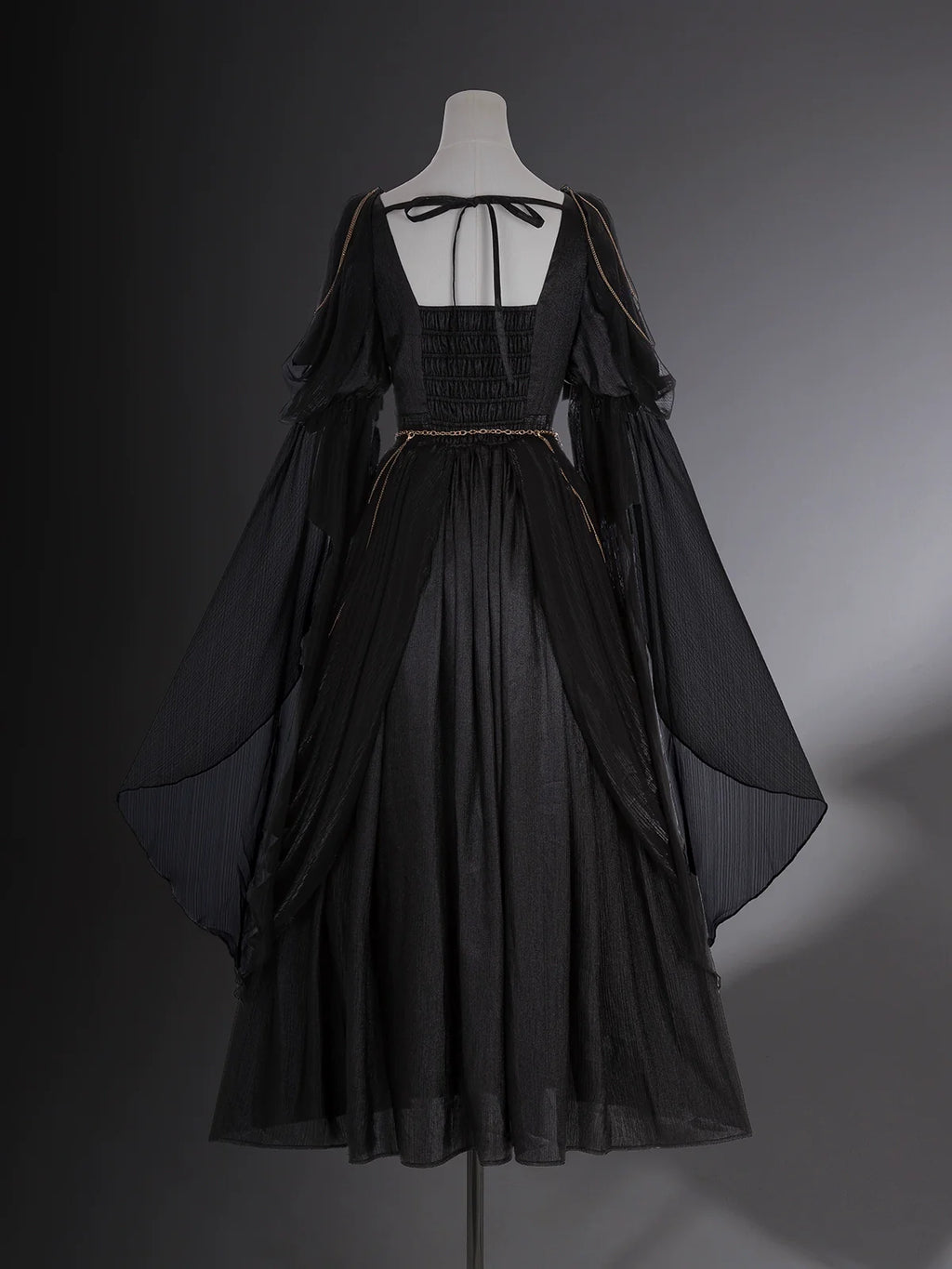 Dark fairy maxi dress: A perfect blend of lace and tassels