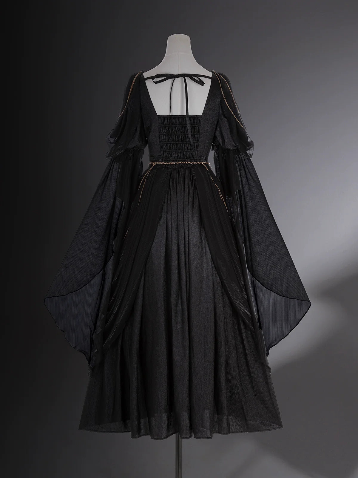 Dark fairy maxi dress: A perfect blend of lace and tassels